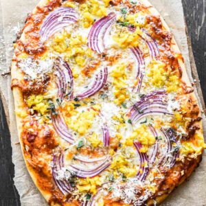Close up image of pizza fresh out of the oven.