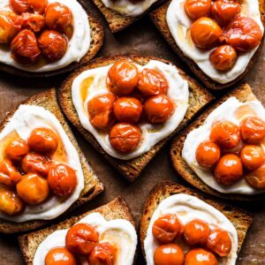 Tomato confit on whipped ricotta toasts.