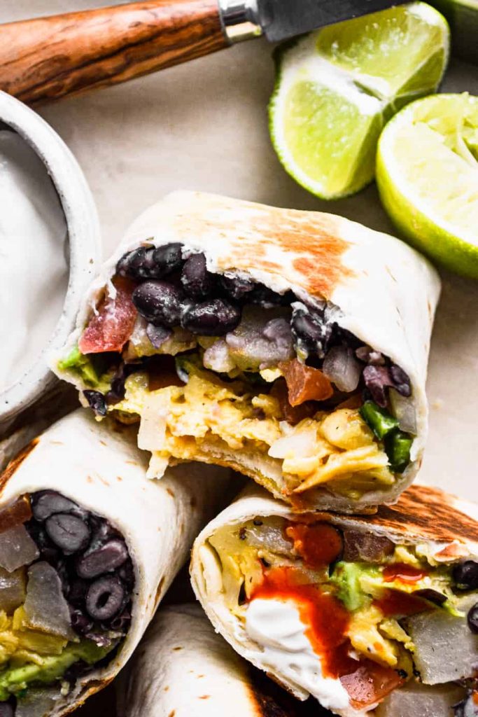 Vegetarian Breakfast Burrito with bite taken out
