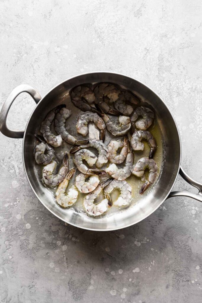 Raw shrimp in the pan.