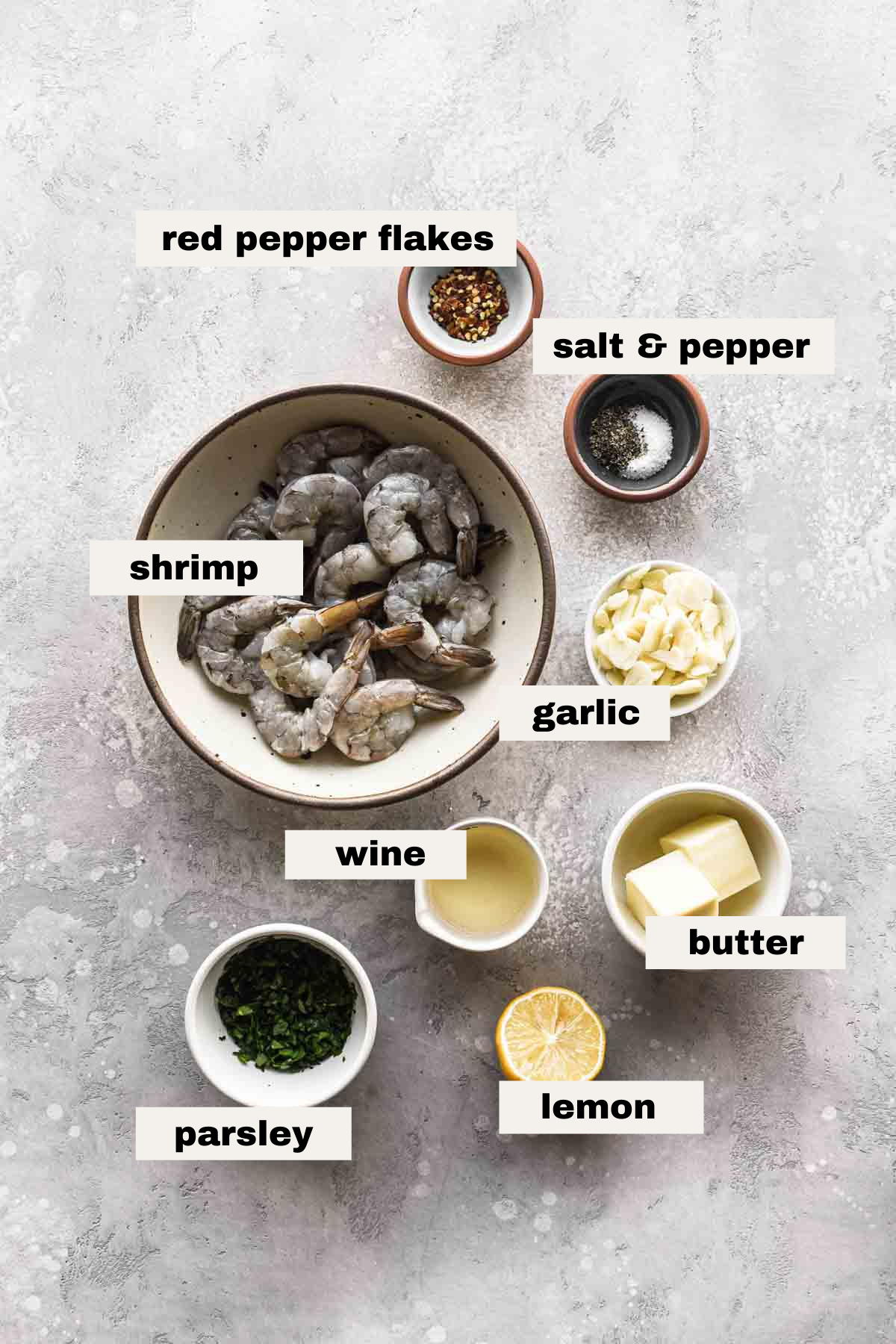 Ingredients laid out on a table with labels. 