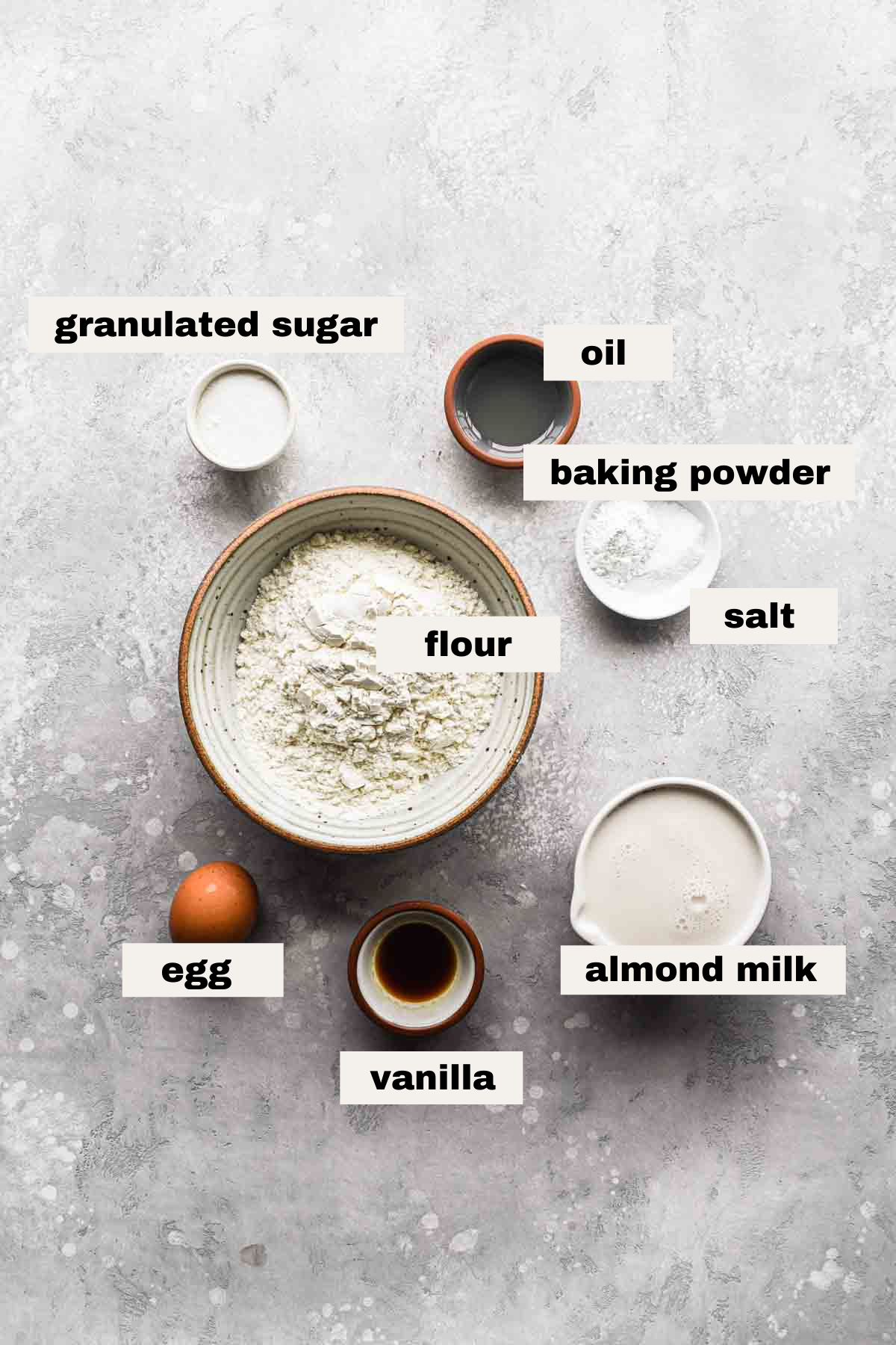 Ingredients on a table for almond milk pancakes.