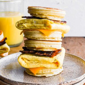 Two homemade McGriddle sandwiches stacked on top of each other.