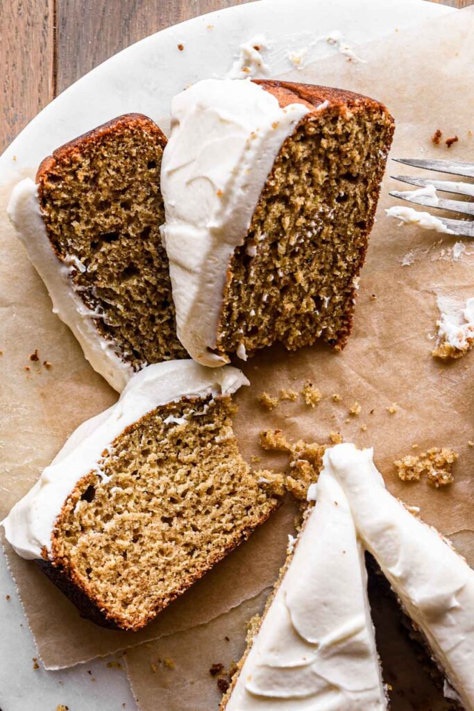 Three slices of spice cake on a serving platter.