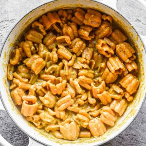 Finished creamy pumpkin pasta sauce in a dutch oven.