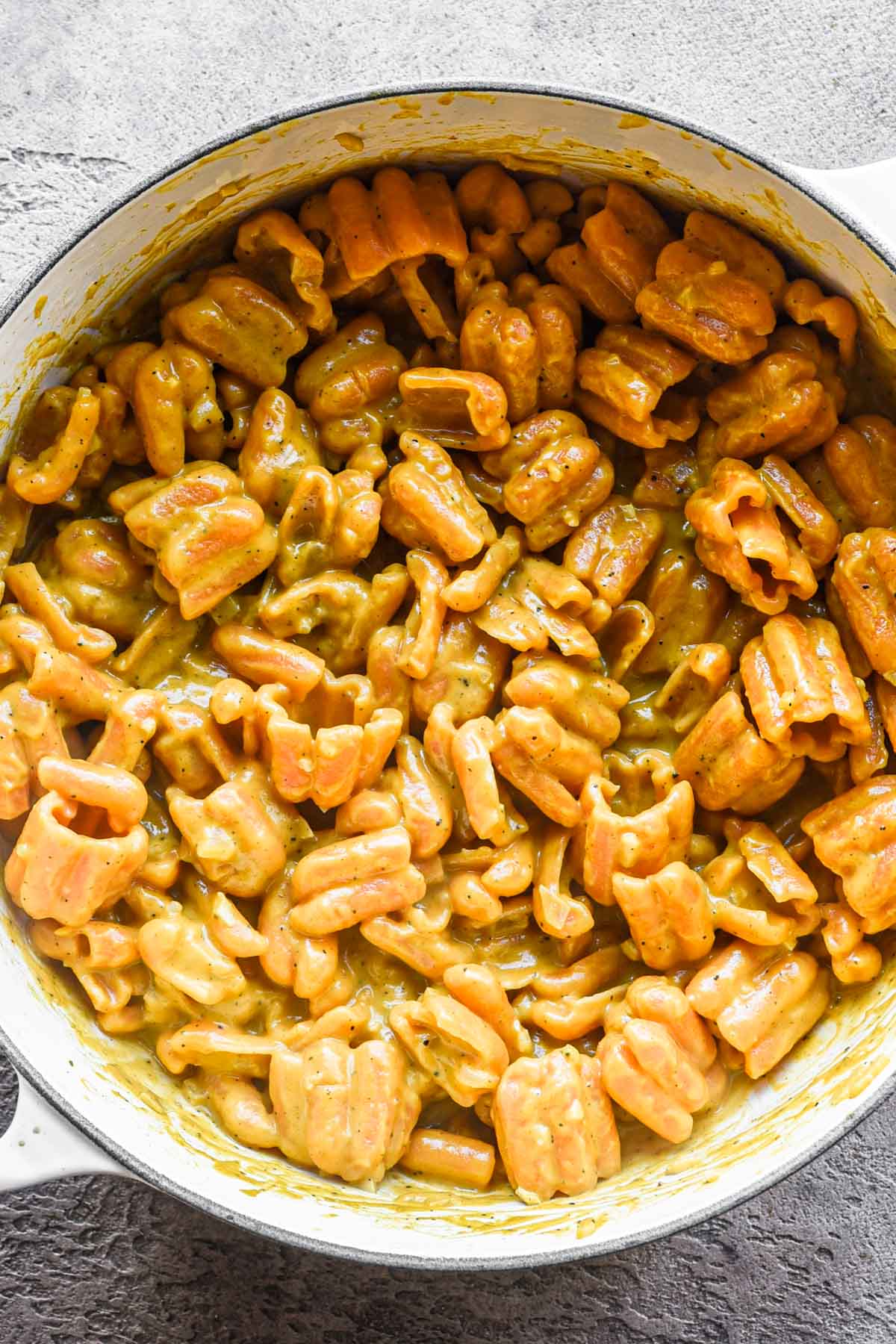 Finished creamy pumpkin pasta sauce in a dutch oven.