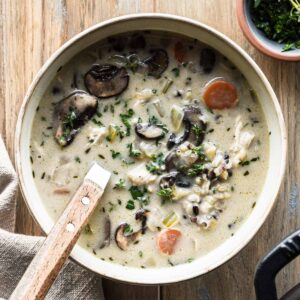 Bowl of creamy chicken mushroom wild rice soup.