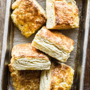 Overhead image of finished ricotta biscuits in a pile.