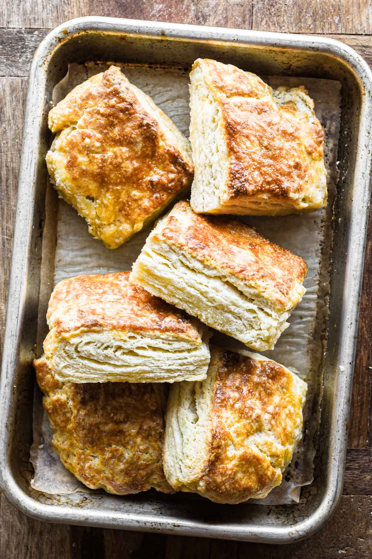Overhead image of finished ricotta biscuits in a pile.