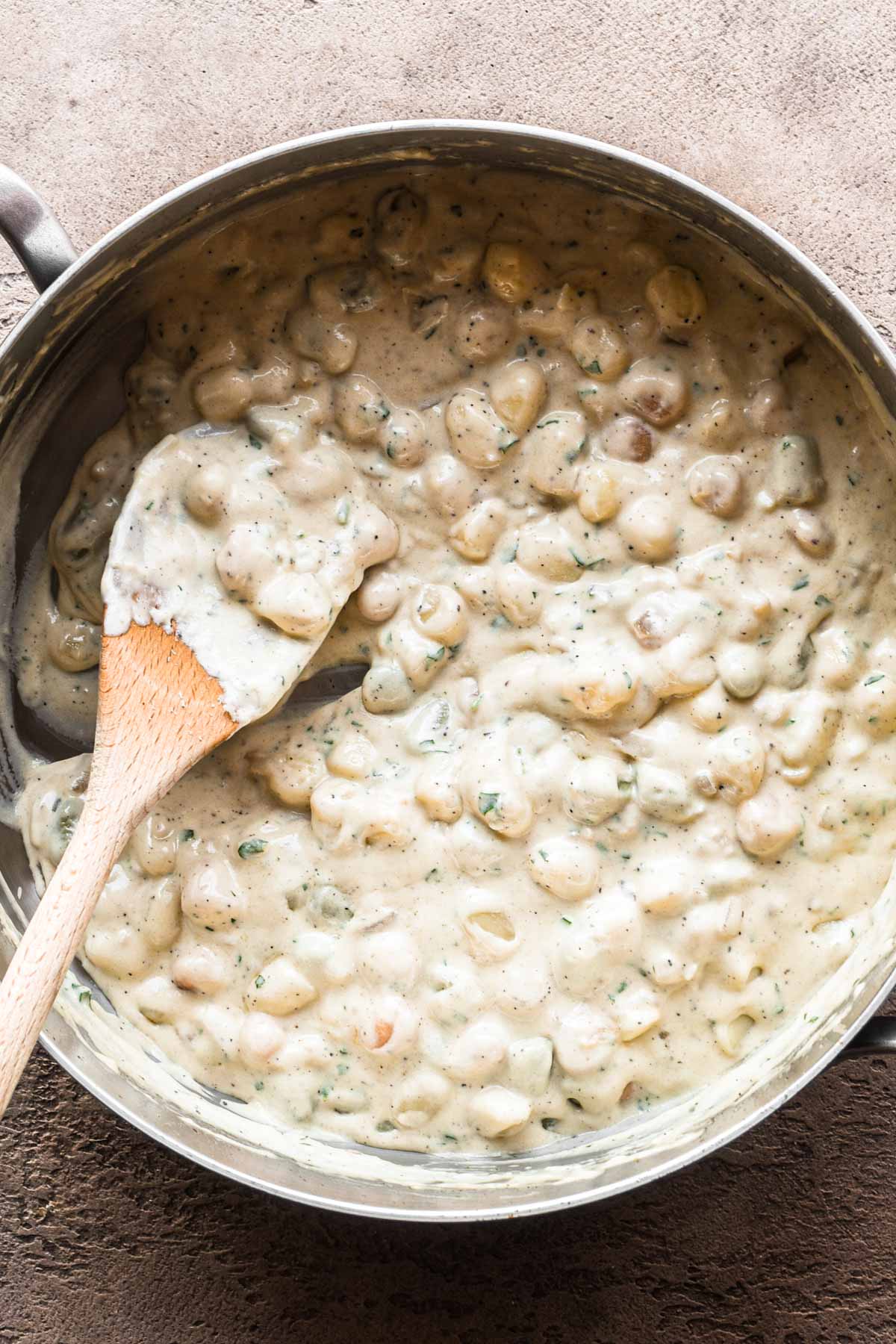 Image of finished cream sauce with gnocchi.