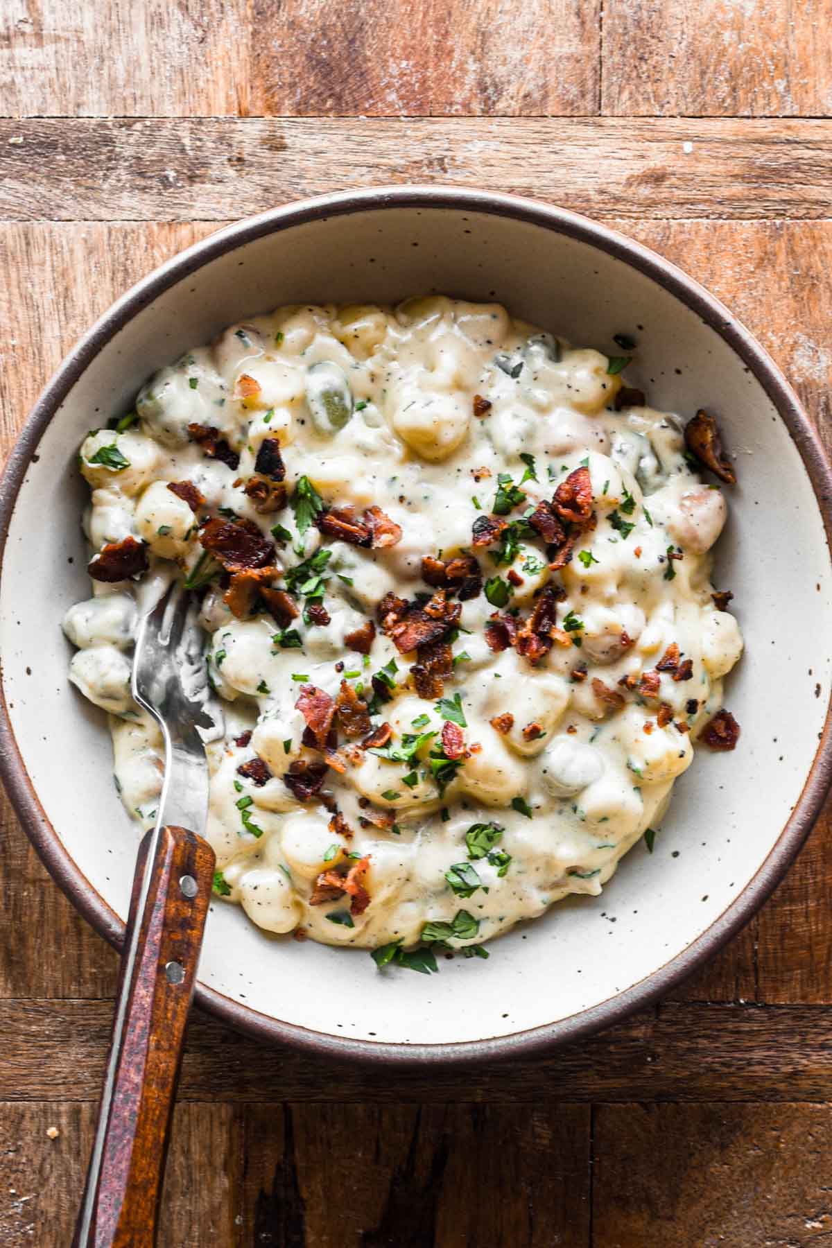 Roasted garlic cream sauce in a serving bowl.