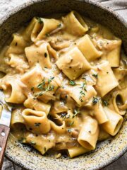 Finished french onion pasta in a bowl.