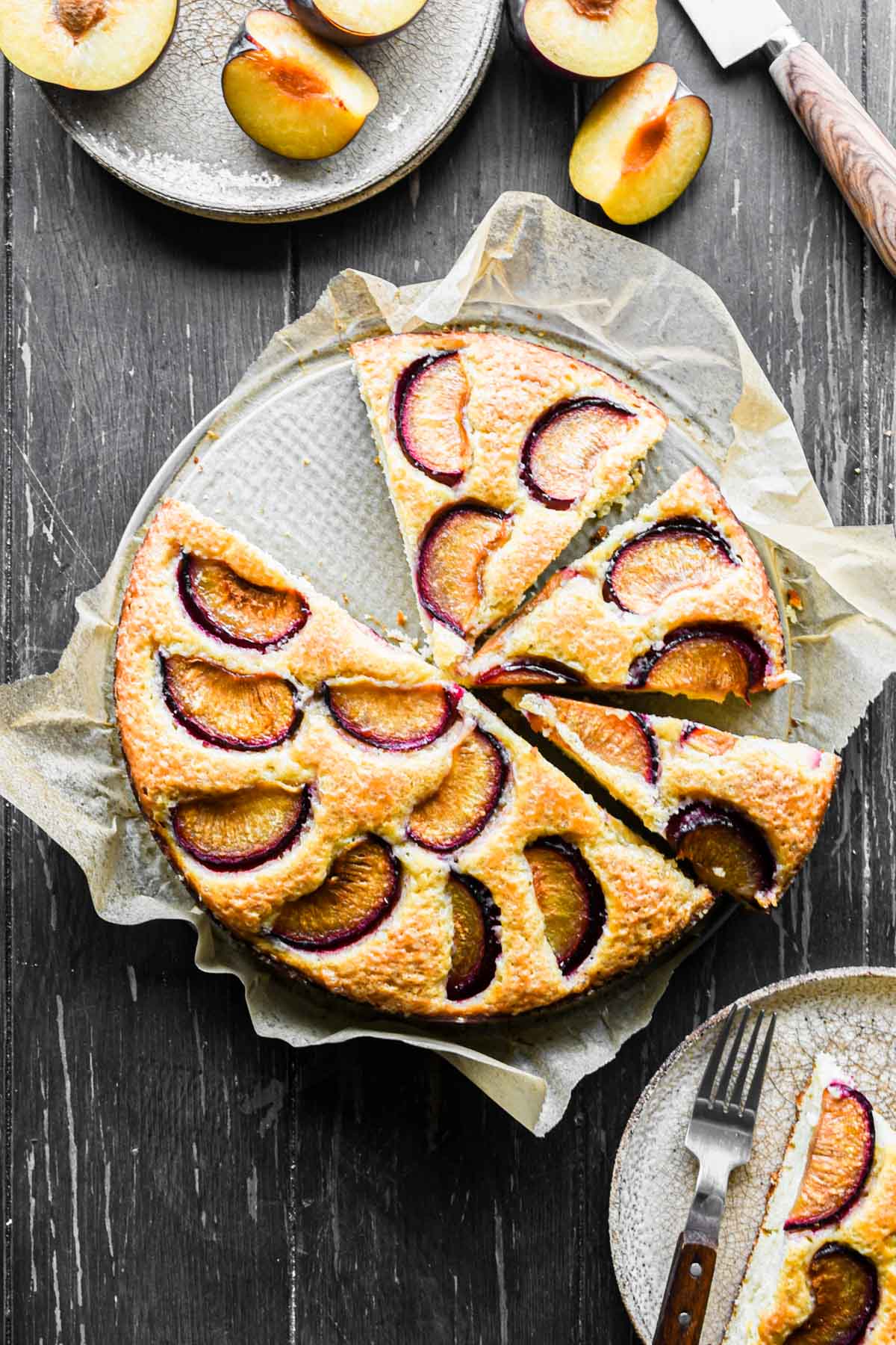 Overhead image of sliced yogurt plum cake.