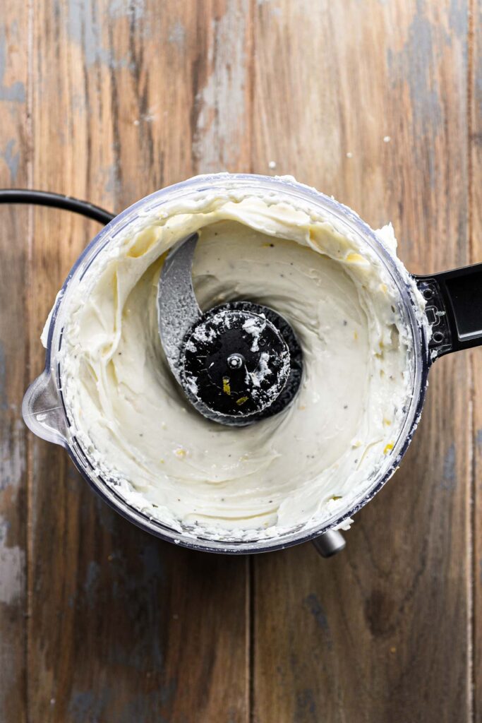 Whipped cheese in the food processor.
