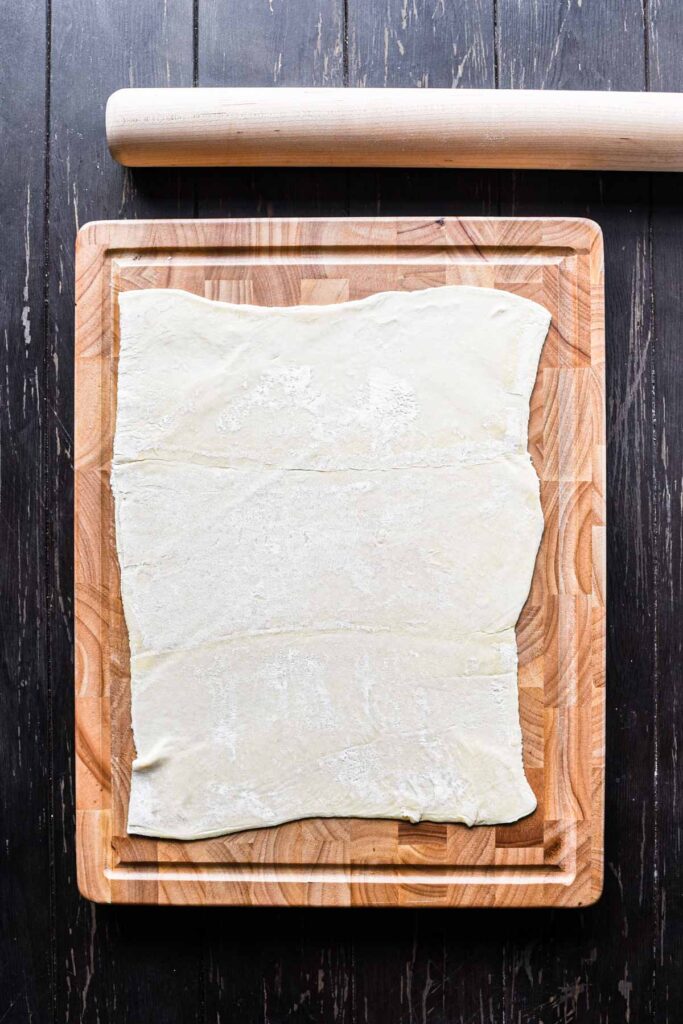 Puff pastry being rolled out.