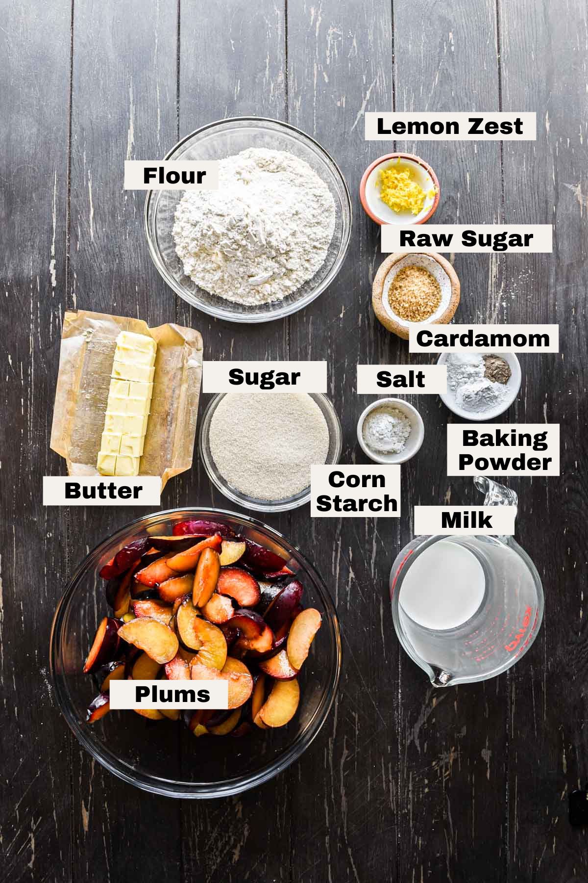 Ingredients on a table for plum cobbler.