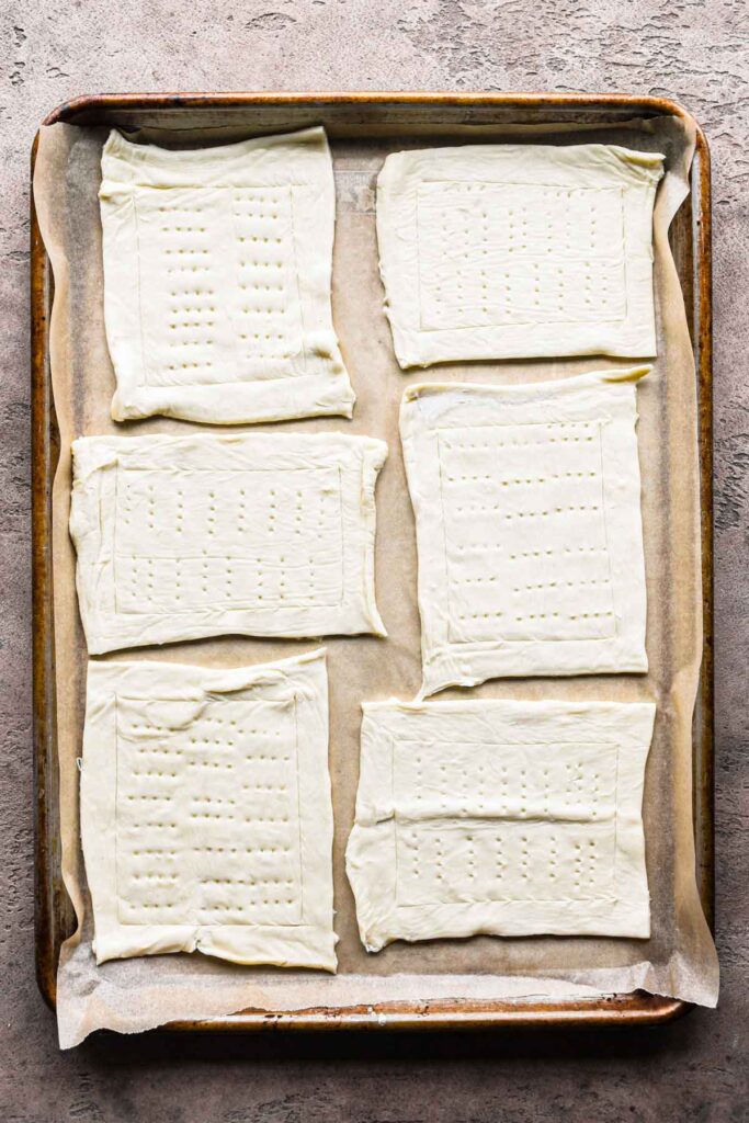 Scored and docked puff pastry.