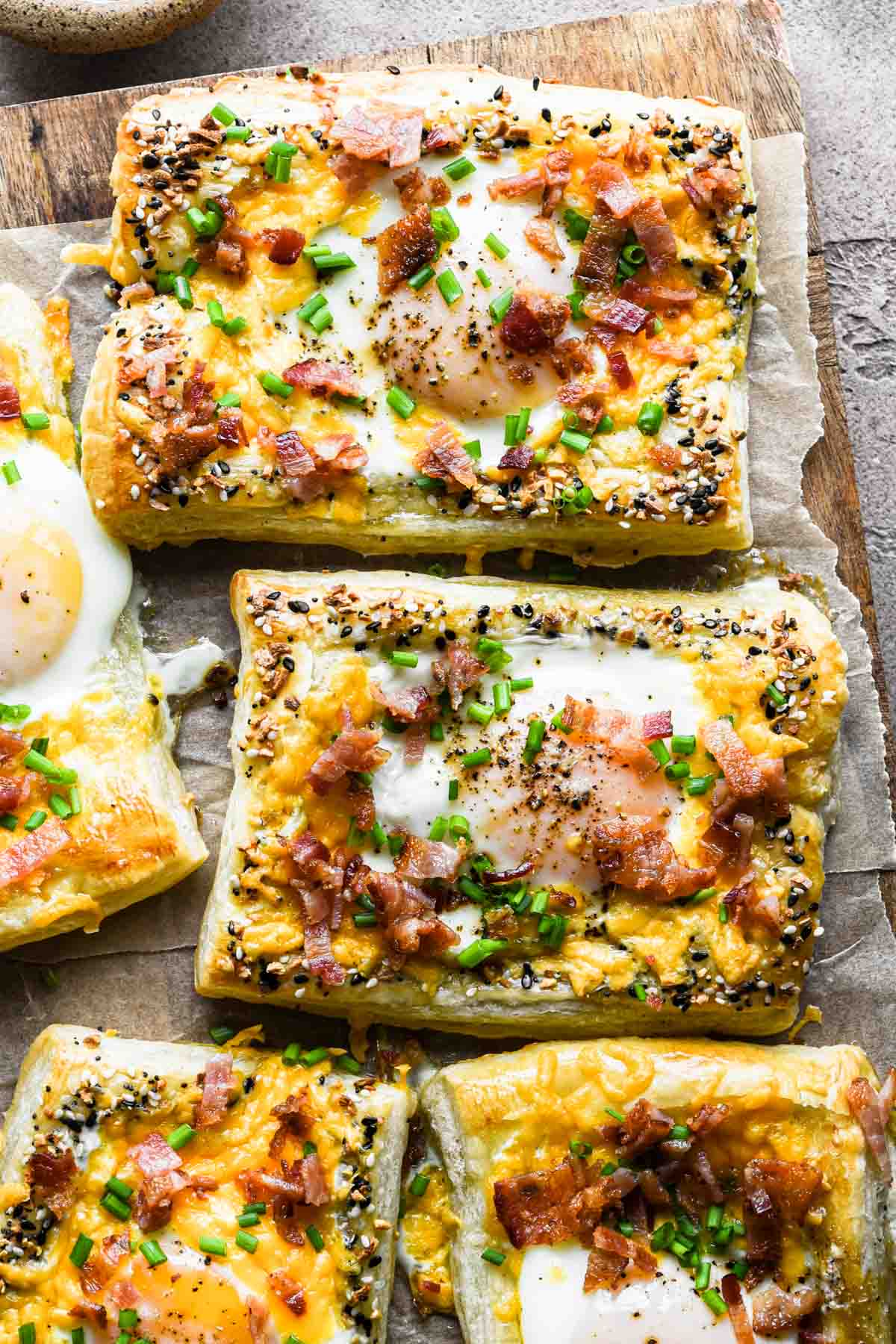 Image of puff pastry breakfast tarts on a serving board.