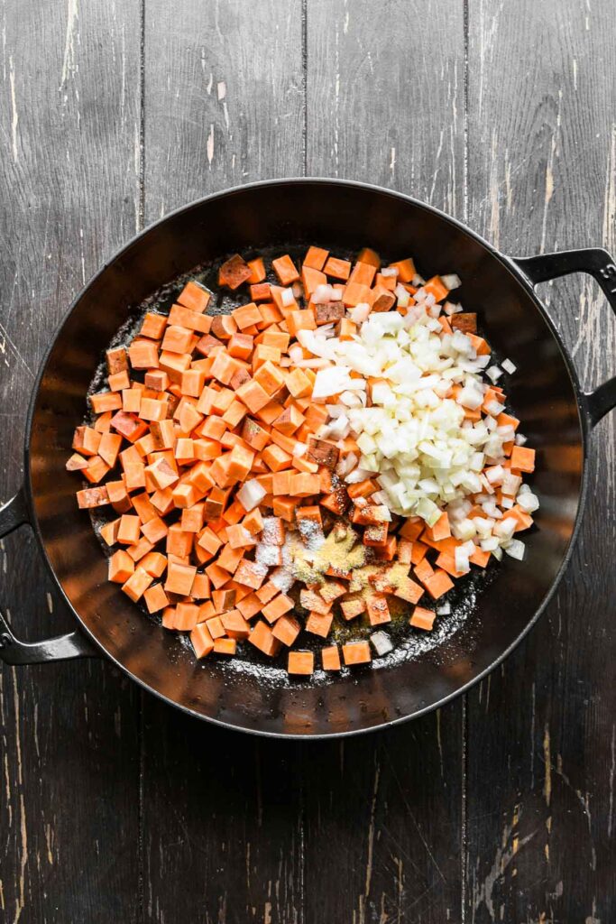 Cooking onion and sweet potatoes.