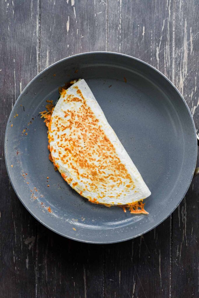 Cooking the quesadillas.