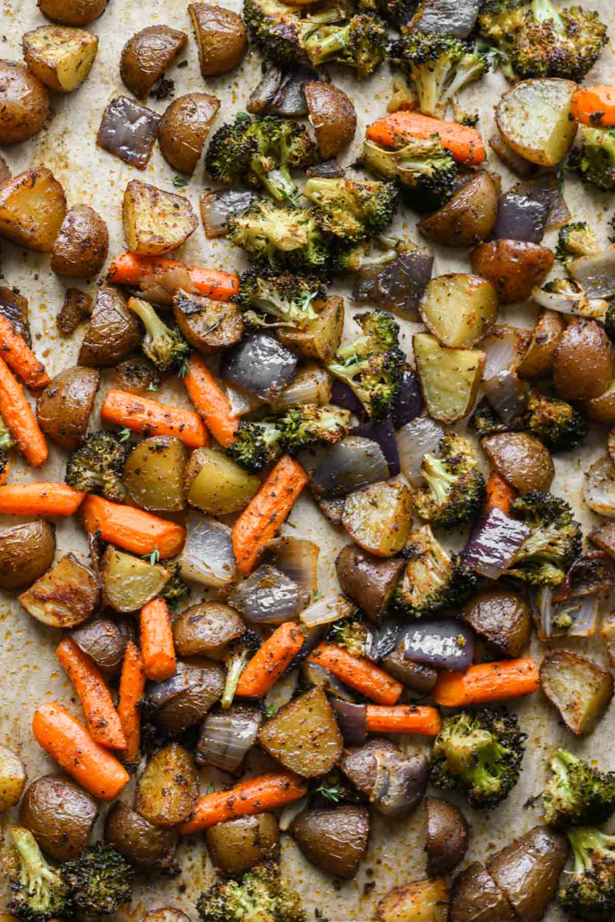 Close up of oven roasted vegetables and potatoes.