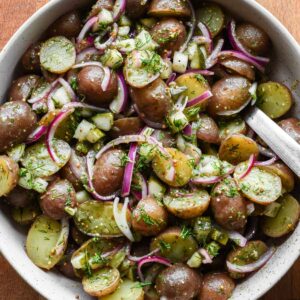 Dill pickle potato salad square image.