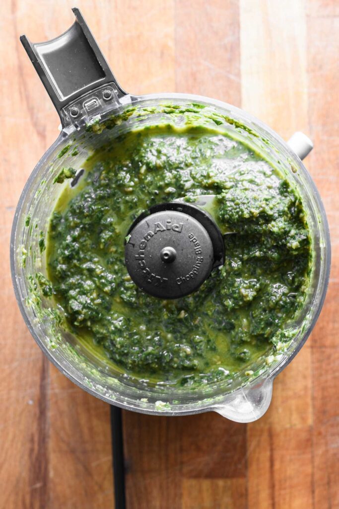 Olive oil added into food processor.