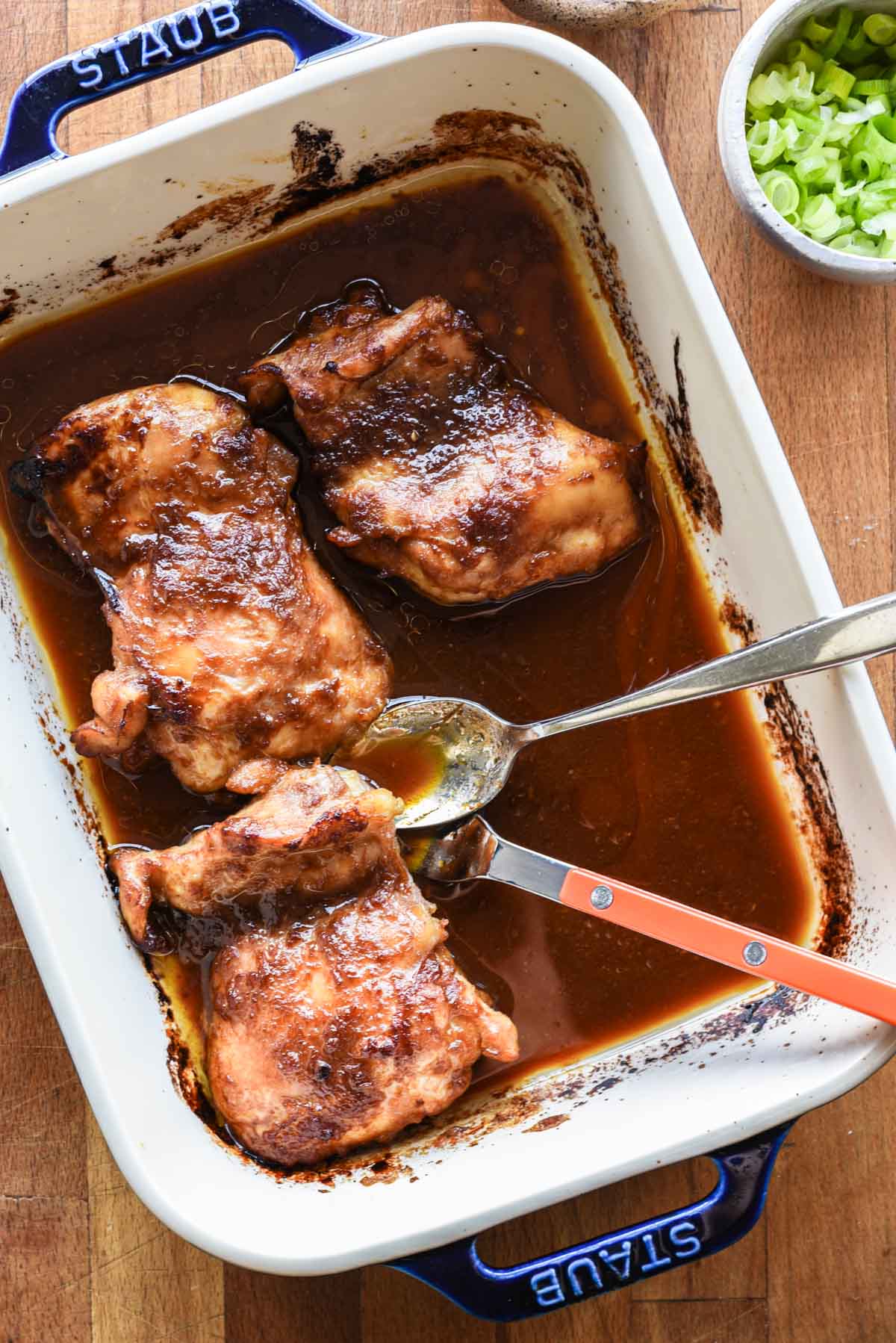 Easy roasted miso chicken thighs in a baking dish.