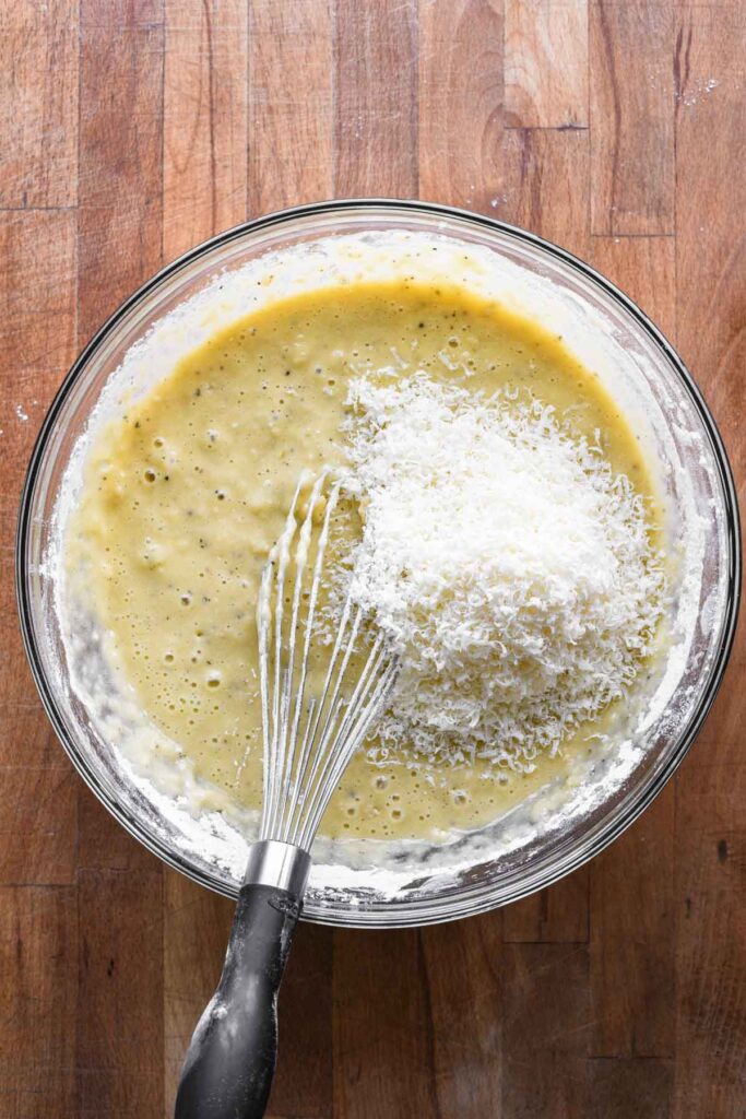 Mostly combined batter, adding parmesan cheese.