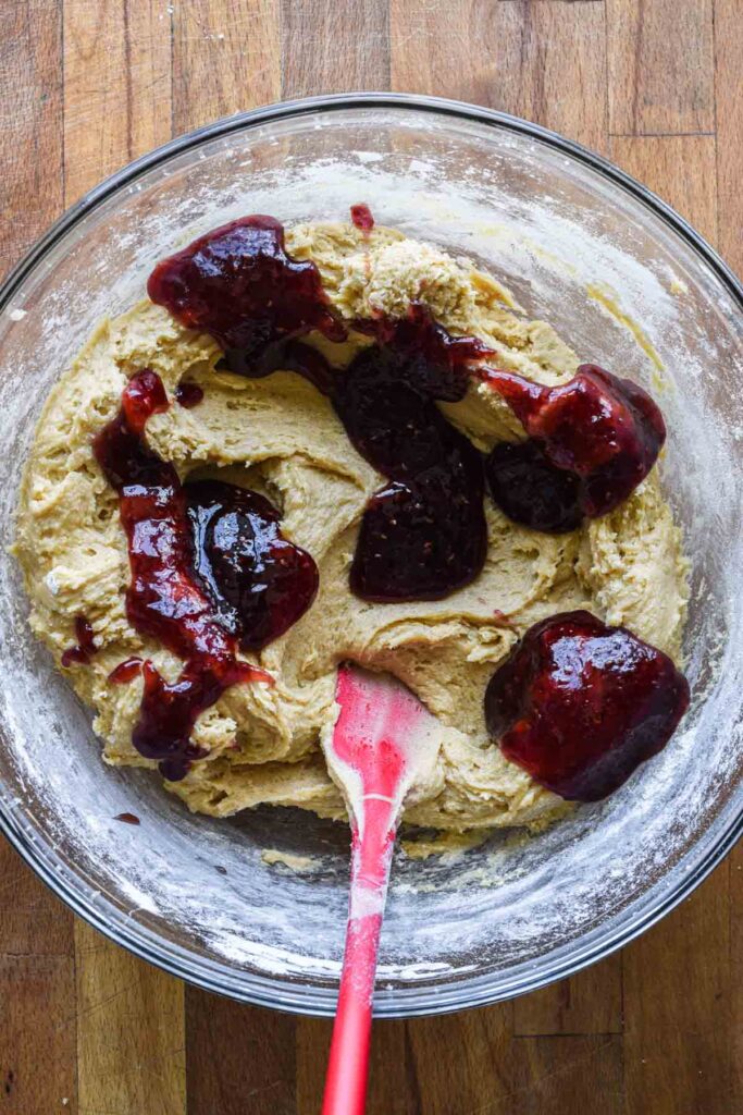 Dolloped jam into peanut butter cookie dough.