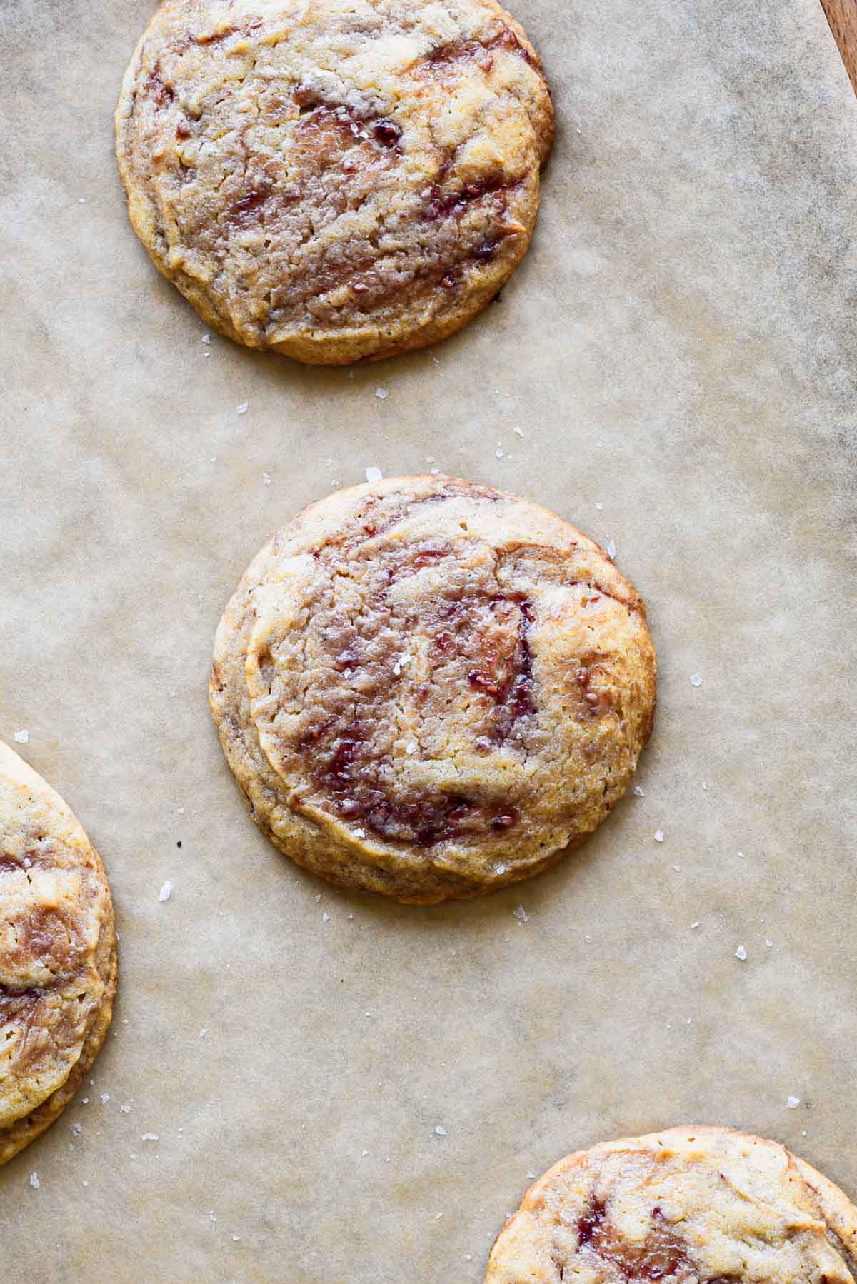 Peanut butter and jelly cookie on baking sheet.
