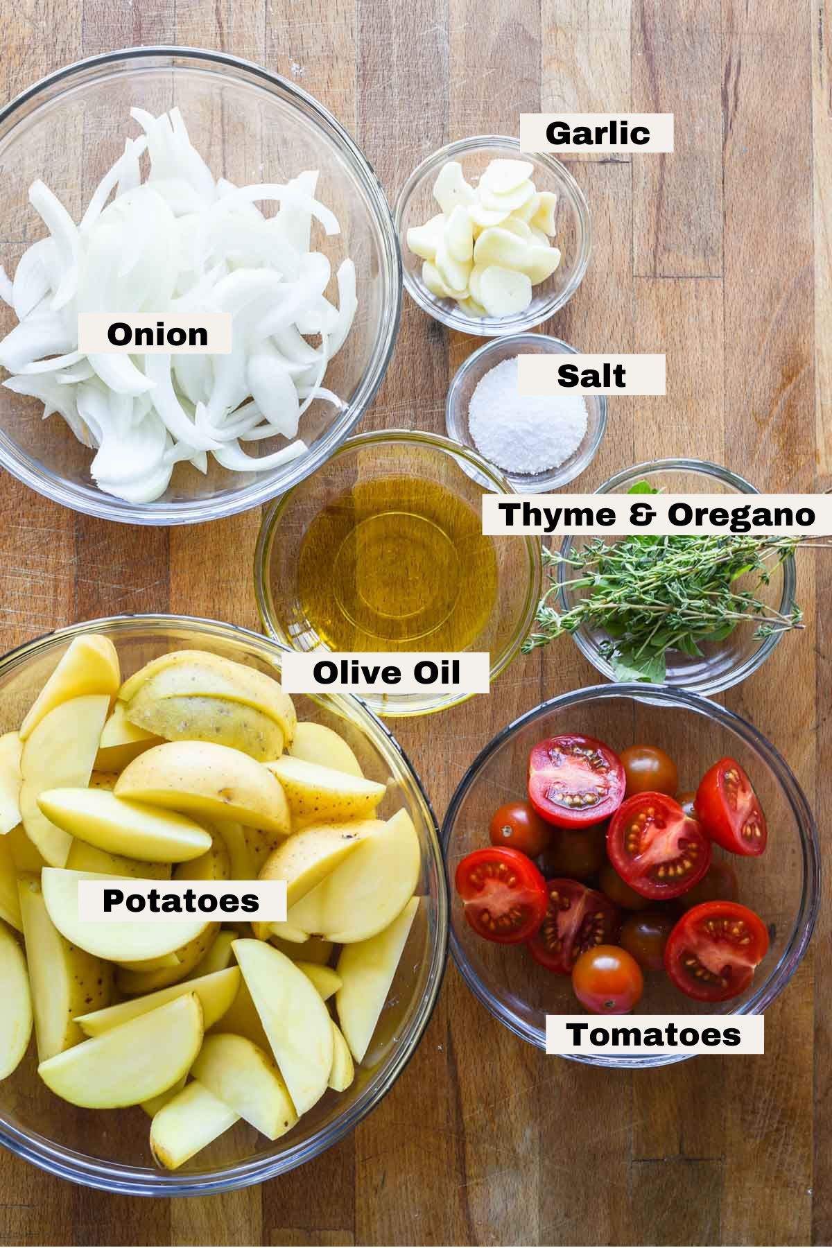 Ingredients for roasted potatoes and tomatoes.