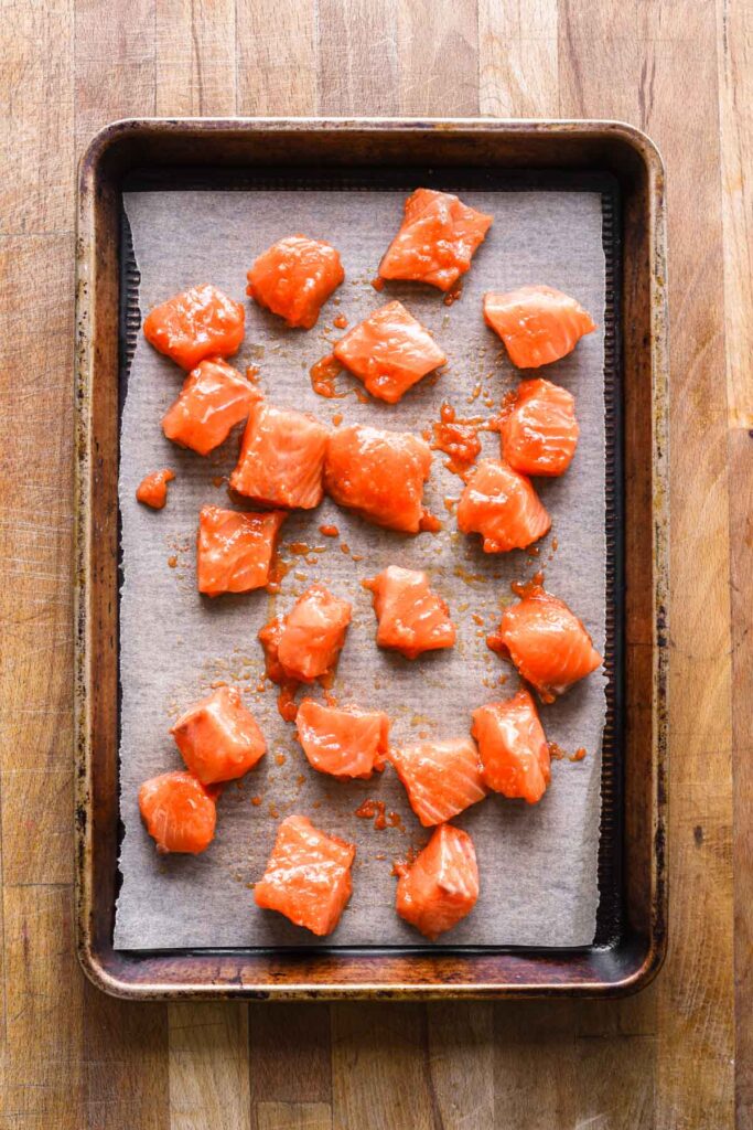 Salmon on a sheet tray.