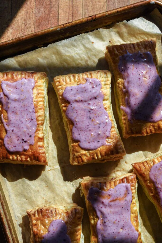 Finished tarts on a sheet tray.