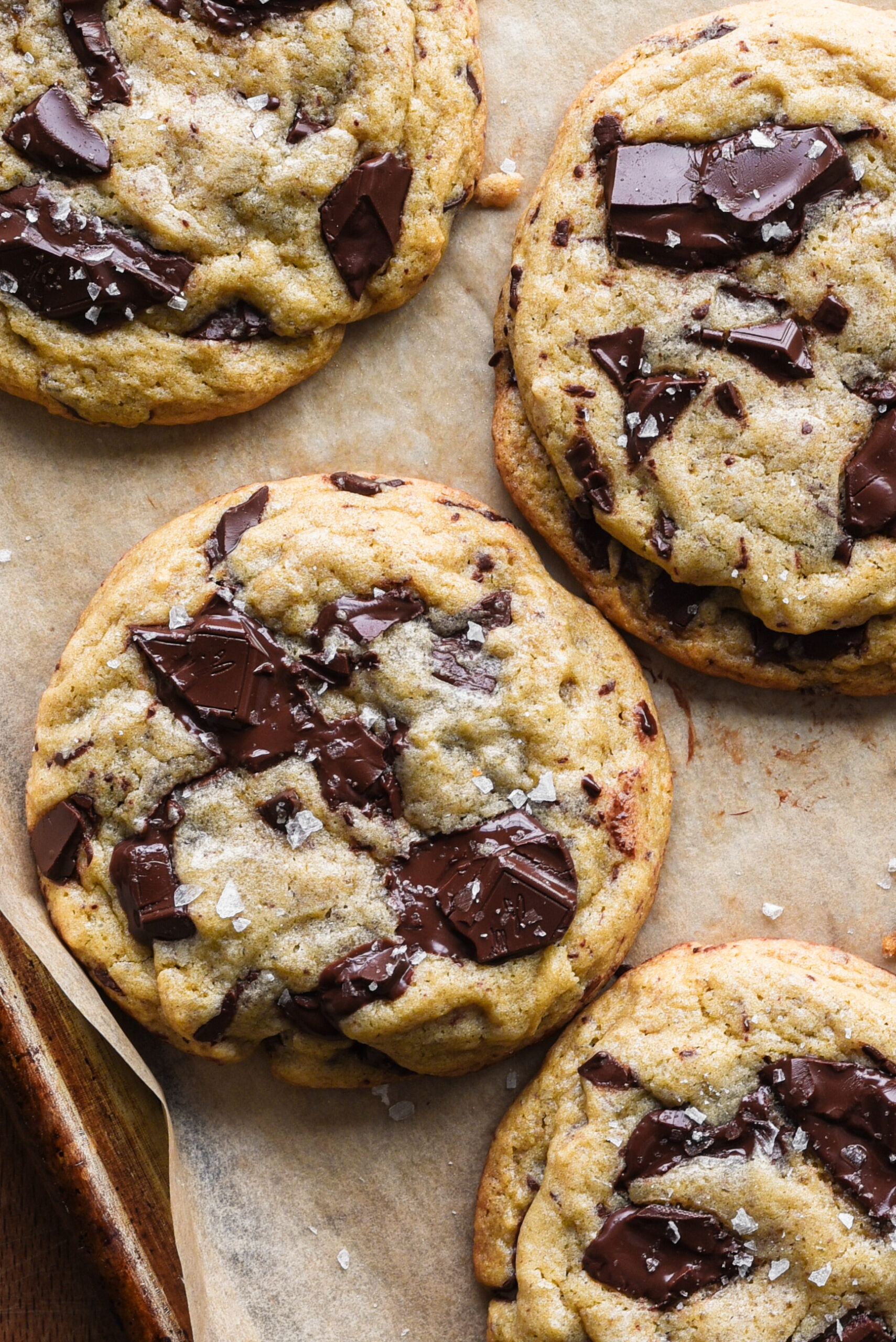 Close up of chocolate chunk cookies with flaky salt.