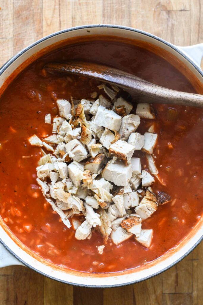 Chicken added to soup.