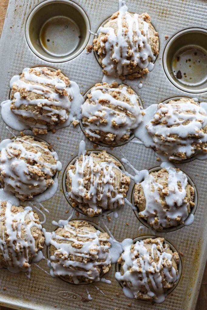 Finished vanilla chai spiced muffins with glaze on top.
