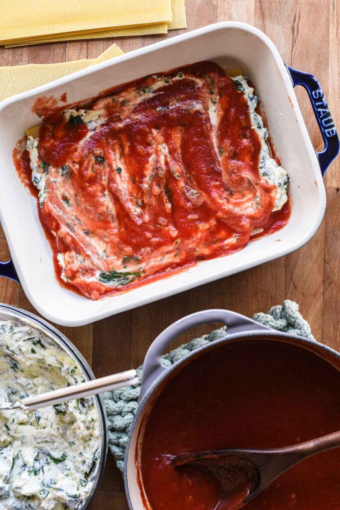 Sauce on top of cheese layer.