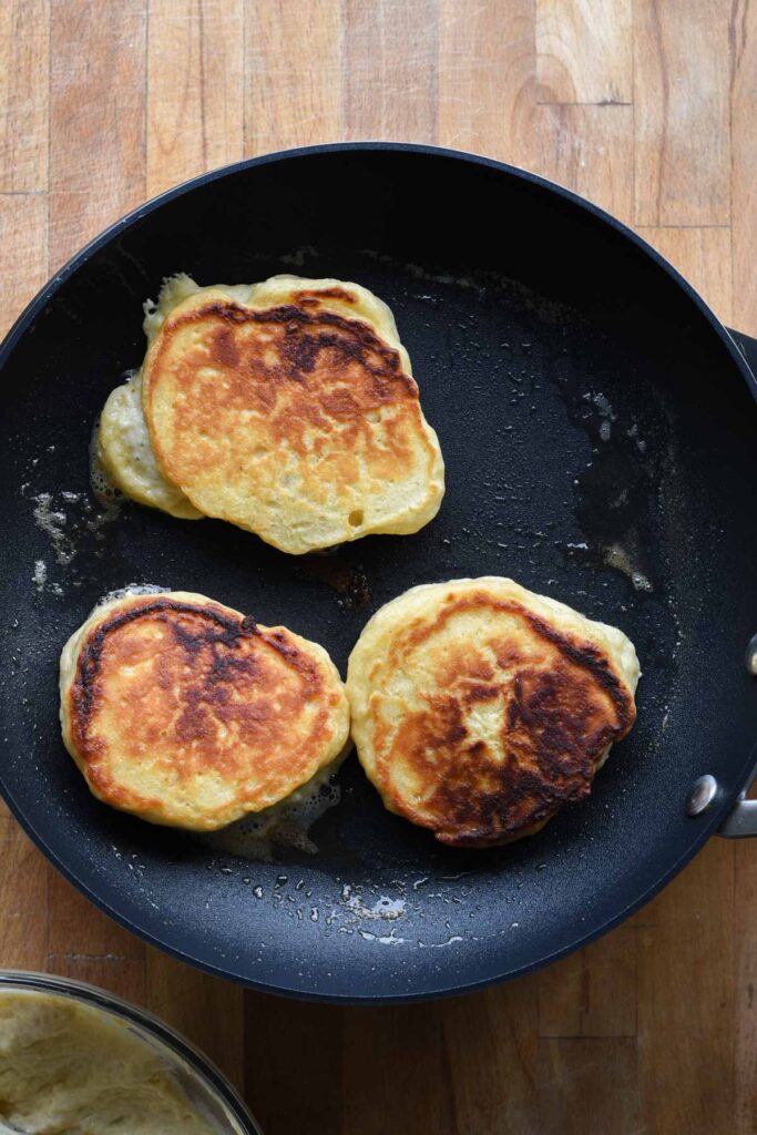 Cooked flipped pancakes.