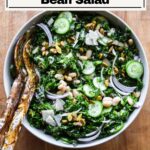 Kale and white bean salad in a serving bowl.