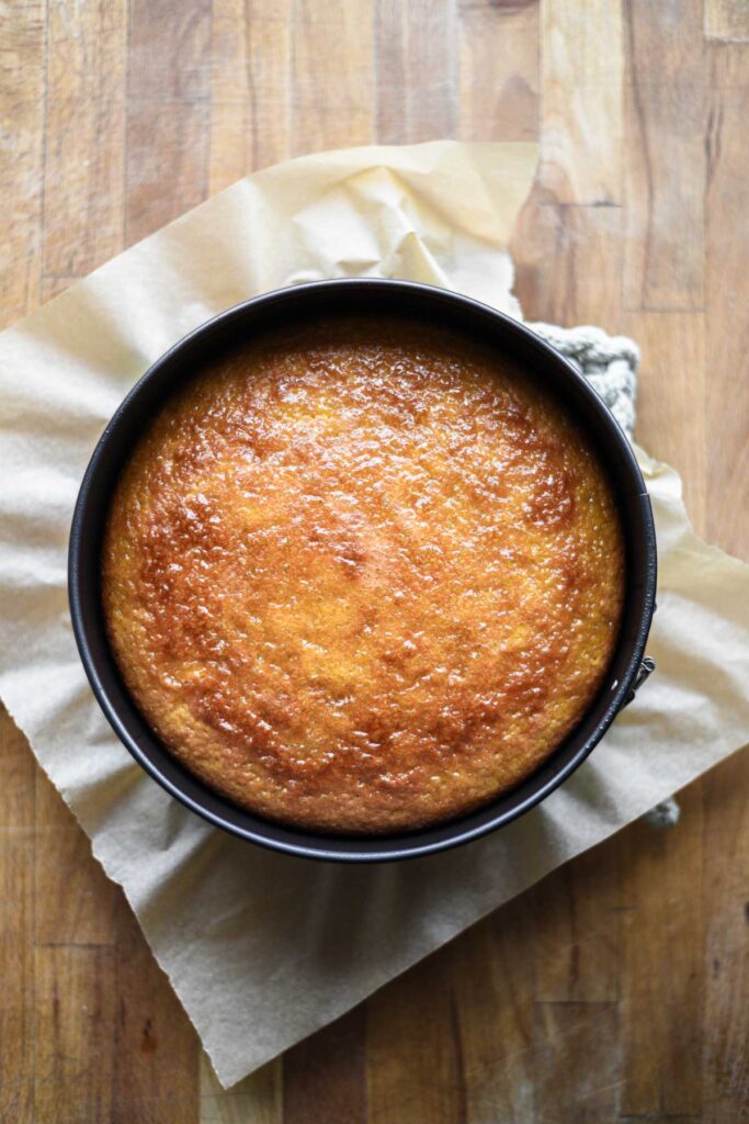 Fresh baked cake with the syrup on top.