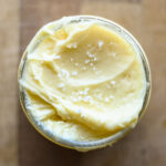 Close up whipped honey butter in a jar.