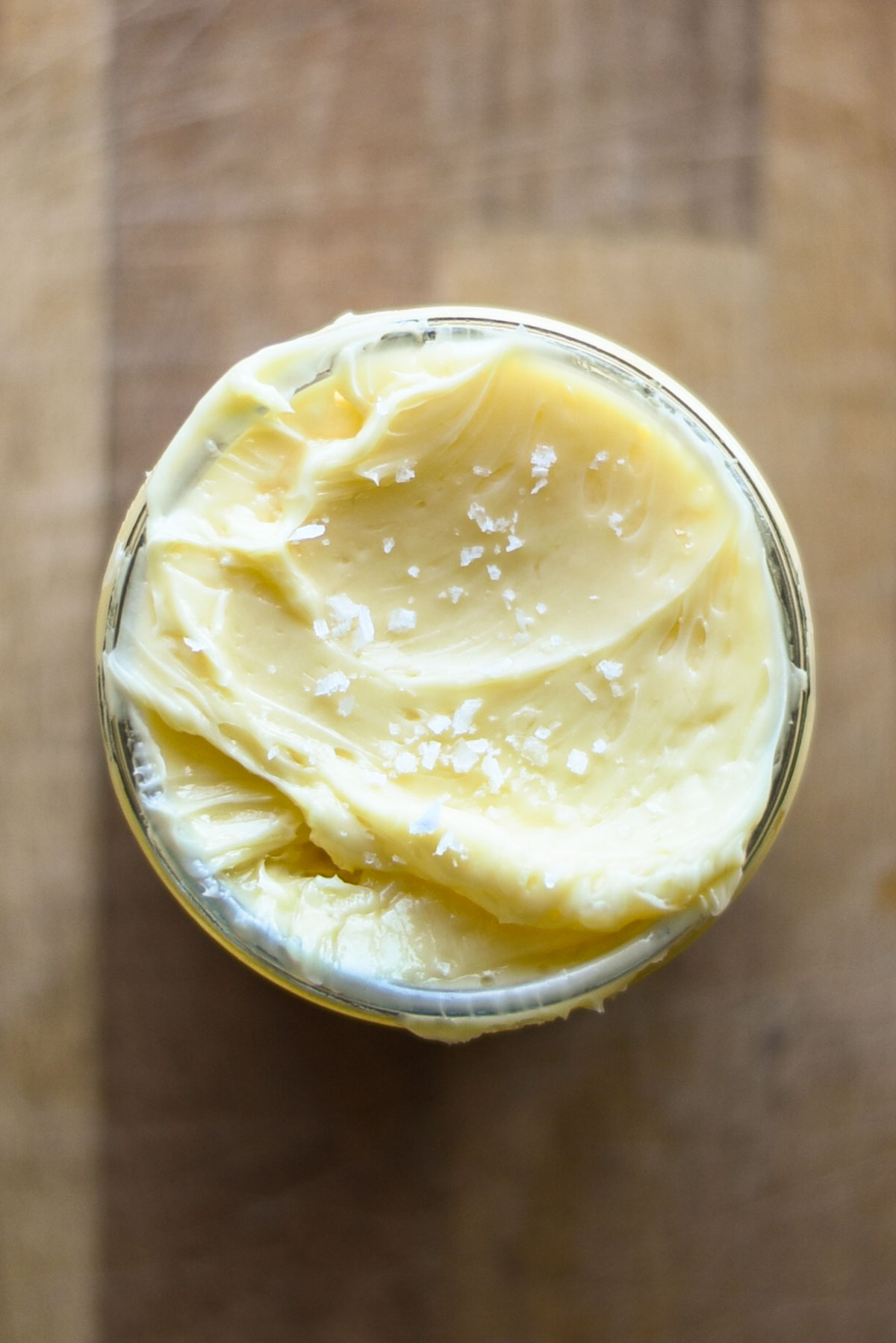 Close up whipped honey butter in a jar.