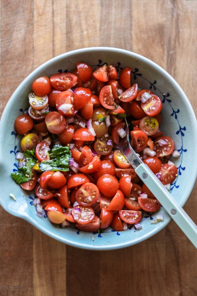 Bruschetta combined in a bowl.