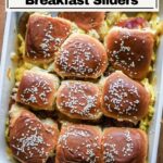 Bacon egg and cheese sliders in a baking dish.m