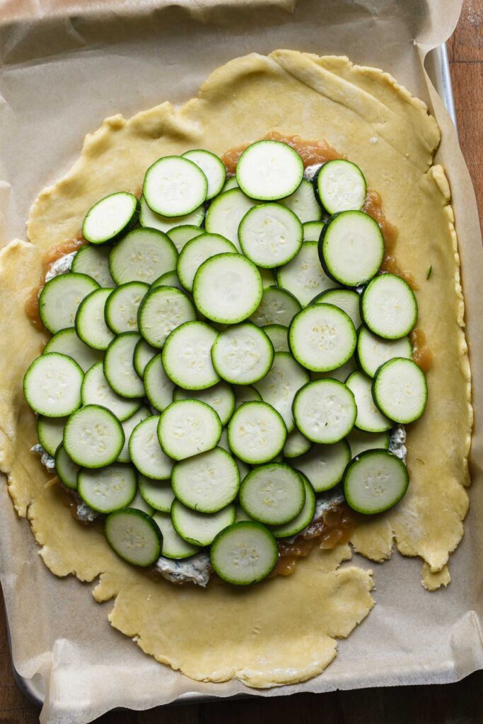 Zucchini slices piled on top.