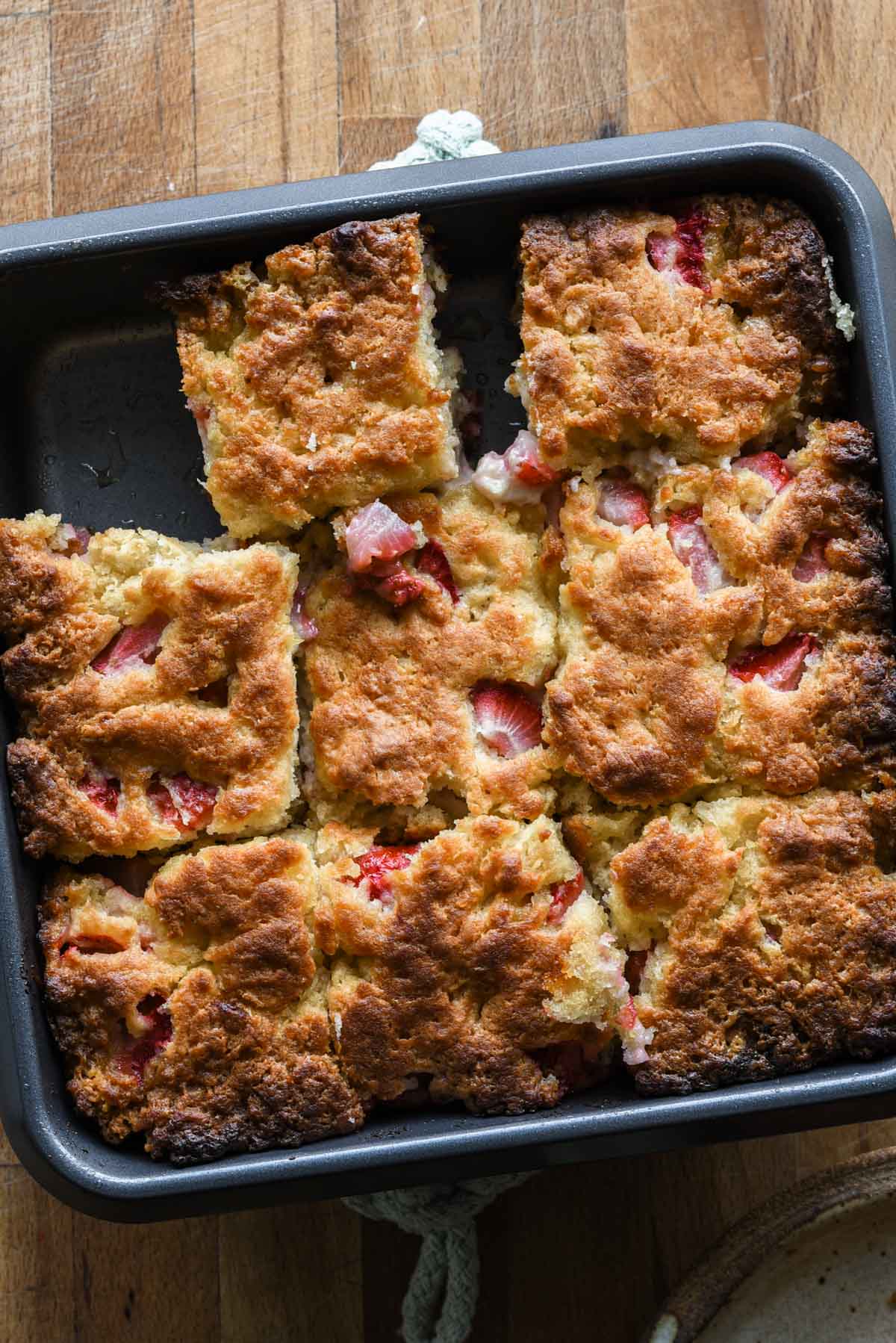 Cut strawberry biscuits in a pan freshly baked and golden brown.